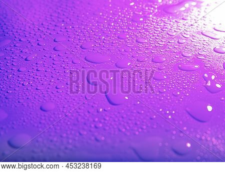 Natural Water Drop Texture. Full Frame Shot Of Water Drops On Window. Violet Background. Violet Text