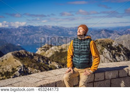 Man Traveller In Mountain Landscape At National Park Lovcen, Montenegro. Travel To Montenegro Concep