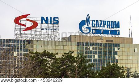 Belgrade, Serbia - December 27, 2021: Russian Oil Company Gazprom Neft And Nis Signs At Top Of Offic