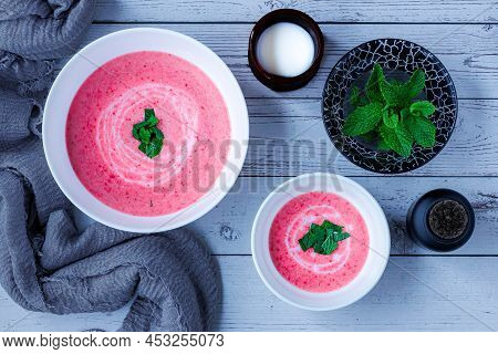Strawberry Cream With Mint On White Table And Overhead View