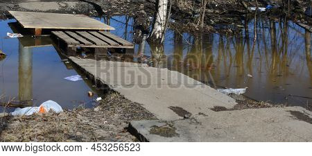 Improvised Makeshift Bridge Over A Ditch With Water