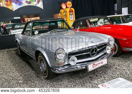 Moscow, Russia - March 6, 2022: German Retro Convertible Car Mercedes-benz 230sl (w113) In The Car H