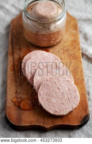Homemade Jagdwurst On A Rustic Wooden Board, Side View. Close-up.