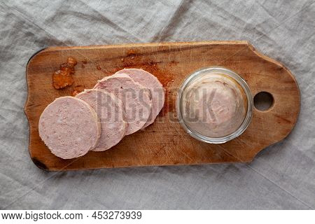 Homemade Jagdwurst On A Rustic Wooden Board, Top View. Flat Lay, Overhead, From Above.