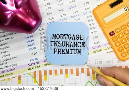 Mortgage Insurance Premium Mip With Stack Of Documents.