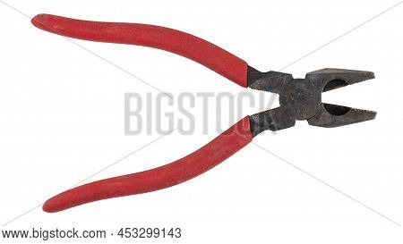Old Pliers With Rubber Grips In Red On A White Background. Top View. Repair Or Building Concept. Fil