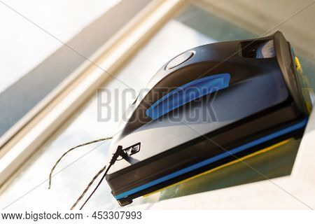Window Cleaning Robot At Work Background Image With Space For Text
