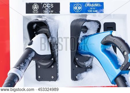 Rocky View County Alberta Canada, April 20 2022: Ice An Snow Covered Petro Canada Fast Charge Ev Cha