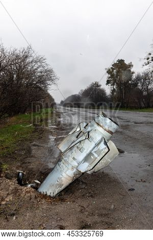 Hostomil Reg, Ukraine - Apr. 22, 2022: An Unexploded Rocket Of The Russian Occupying Troops Sticks O