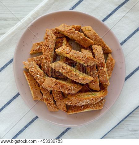 Homemade Italian Cantuccini With Pistachios And Citron On A Plate, Top View. Crispy Pistachio And Ci