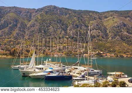 Mediterranean Landscape. Montenegro, Bay Of Kotor. Sailboats And Yachts In Port Of Kotor City Agains