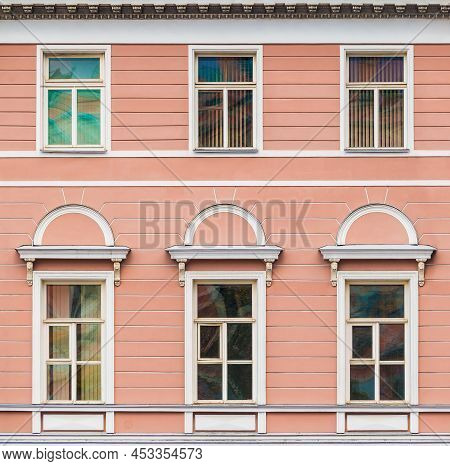 Several Windows In A Row On The Facade Of The Urban Historic Apartment Building Front View, Saint Pe