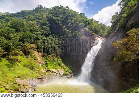 Dunhinda Waterfall In A Sunny Day In Sri Lanka