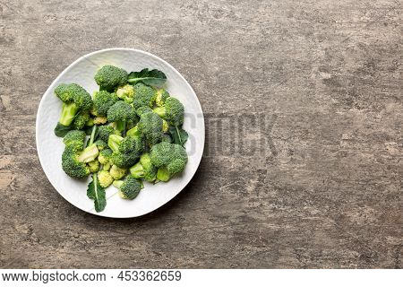 Broccoli Of Fresh Green Broccoli In Bowl Over Coloredbackground. , Close Up. Fresh Vegetable.