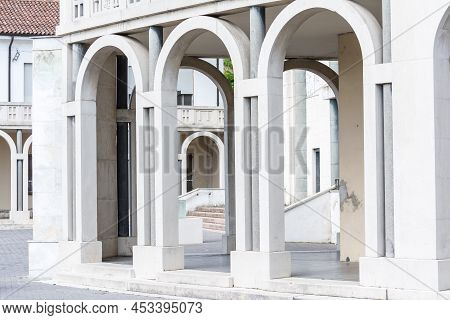 Tresigallo,italy-may 2, 2021:detail Of The Porch In Tresigallo During A Cloudy Day