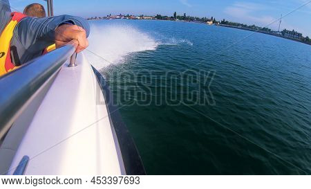 Boat Jumping On Waves On Sunny Summer Day. Yacht Motor Boat Sailing Fast At Sea