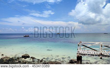 The Sea And Sky With The Wooden Bridge