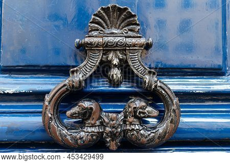 European Vintage Old Metal Wrought Iron Door Knocker. Design Detail. Paris.