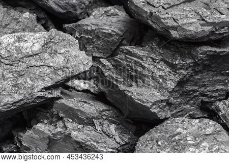 Lumps Of Black Lignite Or Bituminous Coal. Natural Source Of Energy. Mineral Stone Rock.