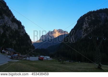 The View Of Mountain Valley At Sunrise. Malga Ciapela, Veneto, Italy.