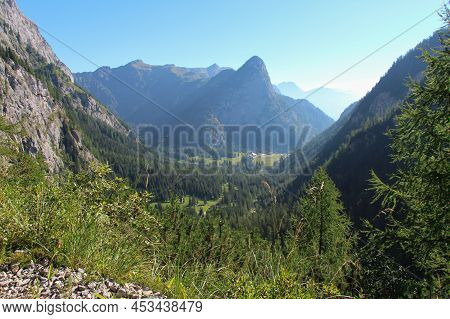 The View Of Mountain Valley At Sunrise. Malga Ciapela, Veneto, Italy.