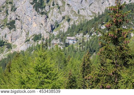 Italy, Ombretta Valley - August 27 2016: The View Of Onorio Falier Mountain Refuge, Italian Alps On 