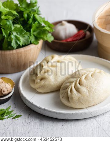 Traditional Korean Steamed Pie, Pyanse Or Pigodi, On White Wooden Background, Selective Focus