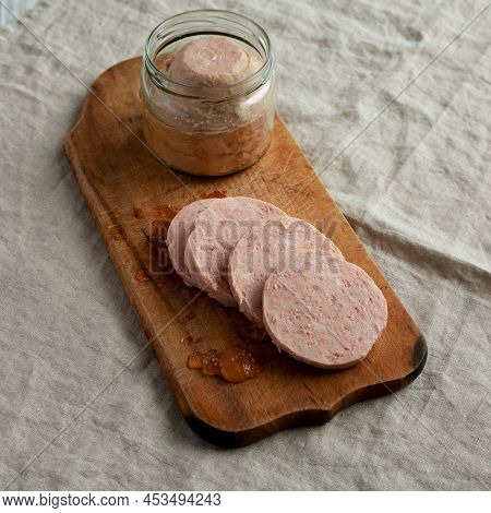 Homemade Jagdwurst On A Rustic Wooden Board, Side View.