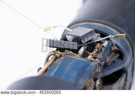 Carbon Brushes Isolated On A White Background. Brushes For Electric Motor.spare Parts For Angle Grin