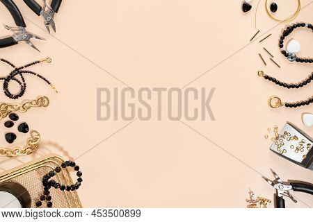Tools And Accessories For Diy Jewelry In The Workplace. Flat Lay On Beige Background. Creative Compo