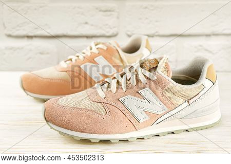 Kyiv, Ukraine- April 19, 2022. New Balance Sneakers- Shoes, Model 996, Pink Suede Leather, On White 