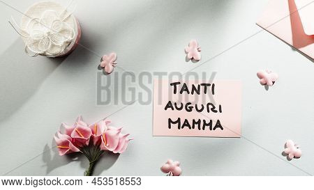 Tanti Auguri Mamma For Mothers Day In Italian Language Background. Overhead Spin Shoot.
