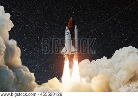 Spaceship Lift Off. Space Shuttle With Smoke And Blast Takes Off Into The Starry Sky. Rocket Starts