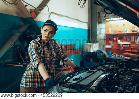 Car Reapir, Exam. Young Pretty Girl, Auto Mechanic Working At Auto Service Station Using Different W