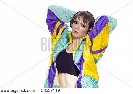 Modern Lifestyle. Winsome Caucasian Female Athlete Sportwoman In Fitness Sexy Outfit Wearing Wireles