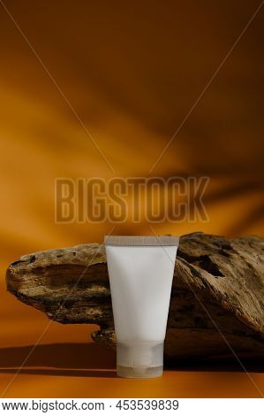 Blank Mosturizing Cream On Minimalistic Background With Shadow Play. Beauty Product Packaging. Body 