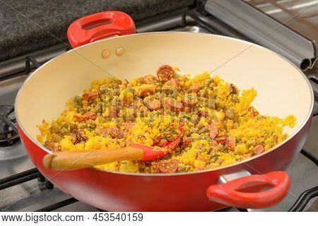 Northeastern Feijao Tropeiro, Brazilian Dish Made With Cuscuz, String Bean, Sausage, Bacon, Chive An