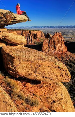 Hiker Injoying The View Of  Monument Canyon, Colorado National Monument, Grand Junction, Usa