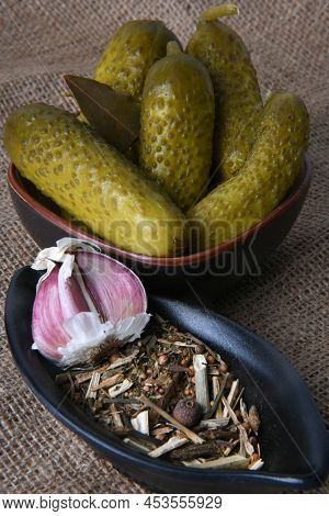 Close Up Of The Pickled Cucumber And Seasoning Cherking Rural On Hessian