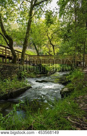 Surrounding Landscape Of The Estanislau Fountain Park And The Lourido River That Divides The Parishe