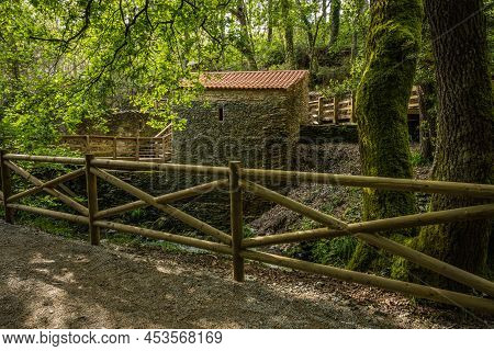 Surrounding Landscape Of The Estanislau Fountain Park And The Lourido River That Divides The Parishe