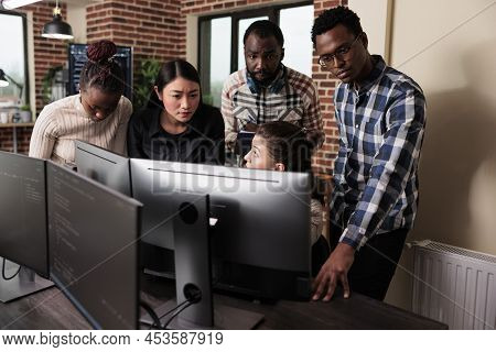 Multiethnic Cyber Security Team Developing Software Algorithm For Information Processing And Network