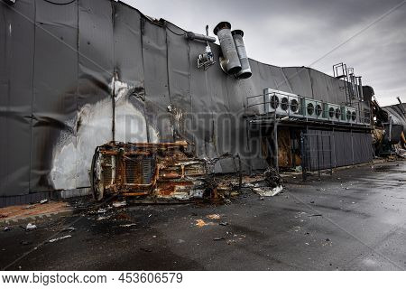 Hostomel, Kyev Region Ukraine - 09.04.2022: A Metal Supermarket Burned Out Completely After A Rocket