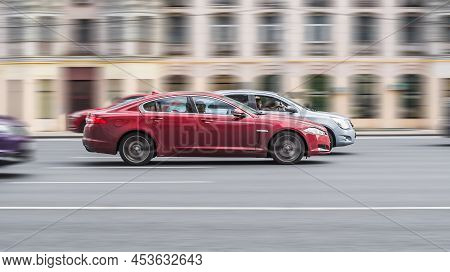 Jaguar Xf X250 Car Moving Fast On The Street Of Moscow. Vehicle Driving Along The Street In City Wit