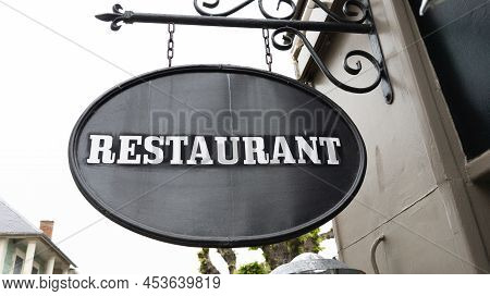 Restaurant Text Sign On Panel Board Facade Building City Street Storefront