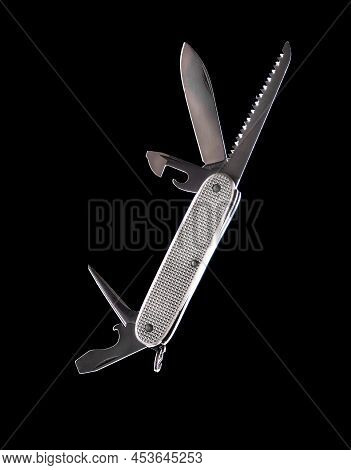 Knife Multi-tool, Isolated On Black Background. Open Multi-tool