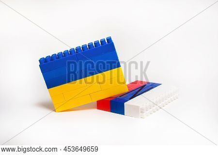 War Between Ukraine And Russia. Concept In The Form Of A Constructor With The Colors Of National Fla