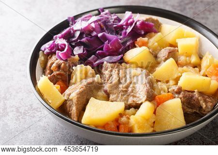 Perfect Scouse With Meat And Vegetables Stew From Liverpool Close-up In A Plate On The Table. Horizo