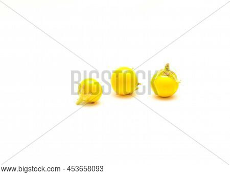 Three Over Ripen Yellow Small Round Eggplant For Heirloom Seed Saving Isolated On White Background