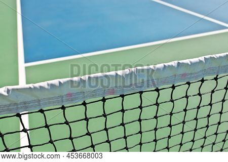 Pickleball Is A Paddleball Racket Sport Combining Elements Of Badminton, Table Tennis, And Tennis.